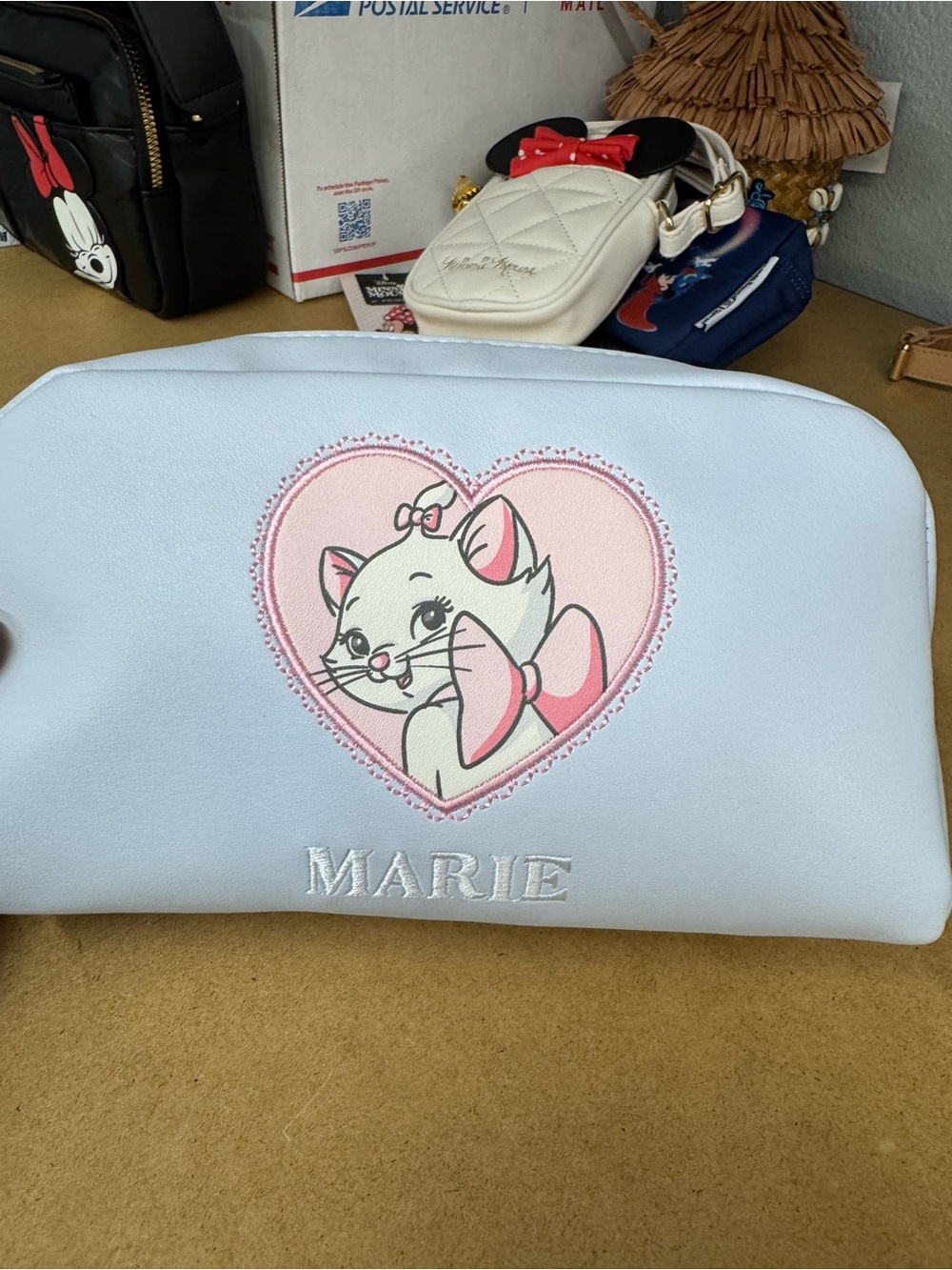 Disney Pastel Blue Cosmetic Pouch with Pink Accents